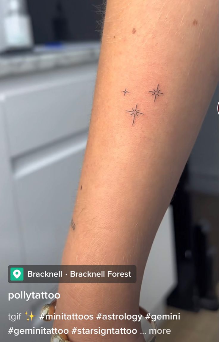 a person with a small tattoo on their arm that reads,'brachiai forest '