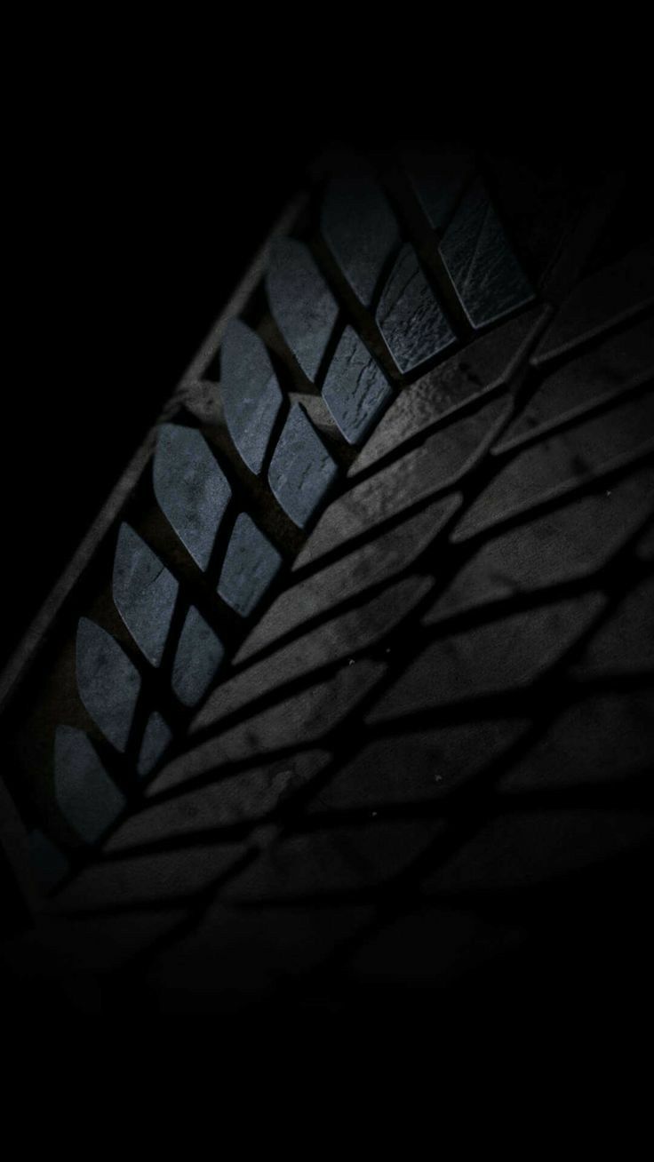 the tire tread is casting a shadow in the dark