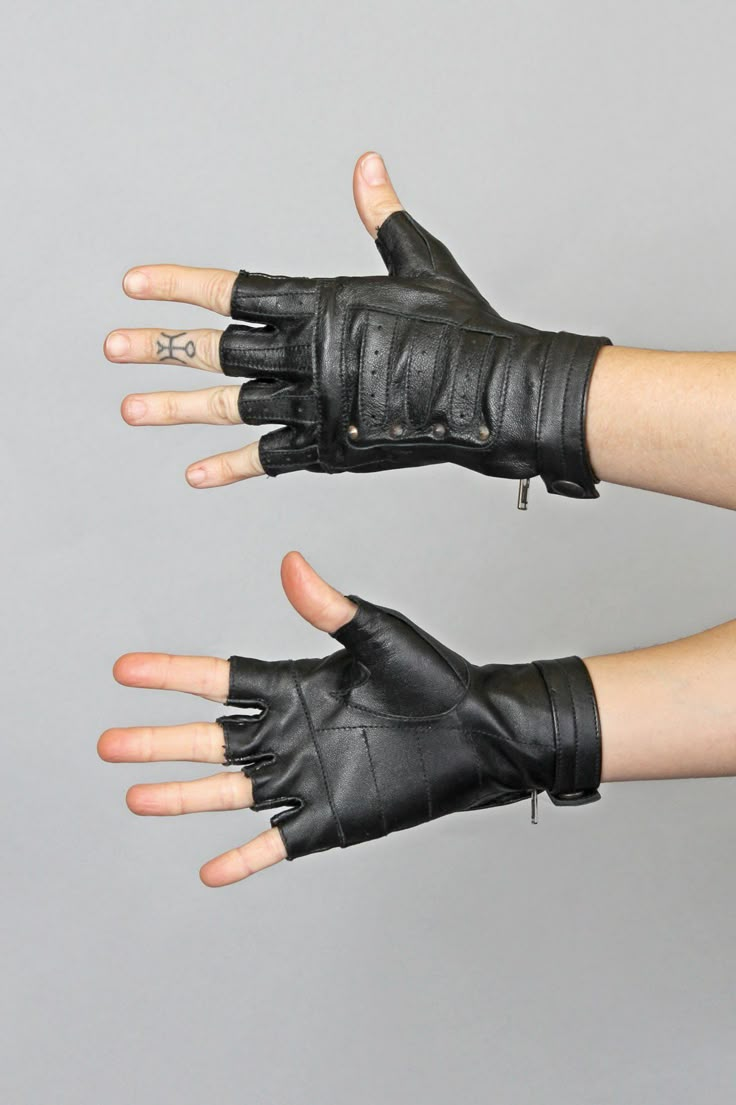 Join the revolution with this soft and comfortable pair of leather gloves! Unisex 100% leather Brass stud detail Zipper/snap closure Ethically handcrafted Made exclusively for Five and Diamond Brass Knuckle Gloves, Fingerless Gloves Reference, Steam Trunk, Fingerless Leather Gloves, Gloves Black, Estilo Punk, Fantasy Clothing, Character Outfits, Leather Gloves