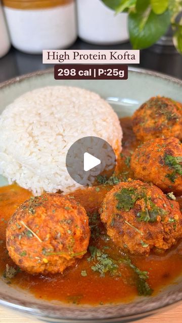 a plate filled with meatballs and rice on top of a table