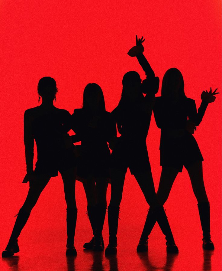 the silhouettes of four women dancing against a red background