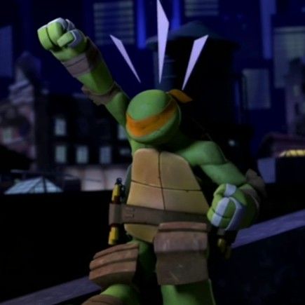 the teenage mutant ninja turtle is holding his fist up