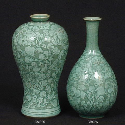 two green vases sitting next to each other on a black background with white writing