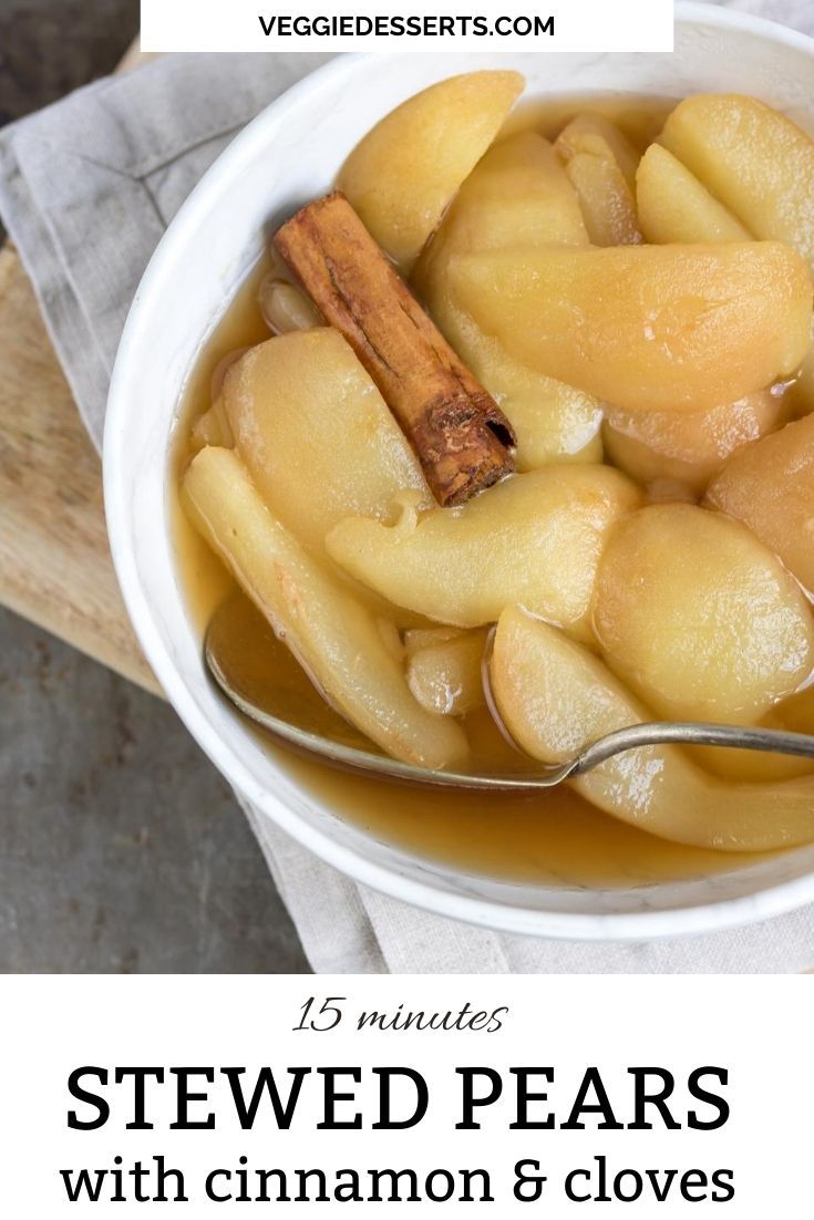 a white bowl filled with sliced pears and cinnamon