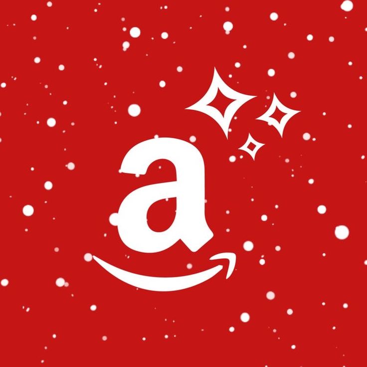 an amazon logo on a red background with snow flakes and stars in the air