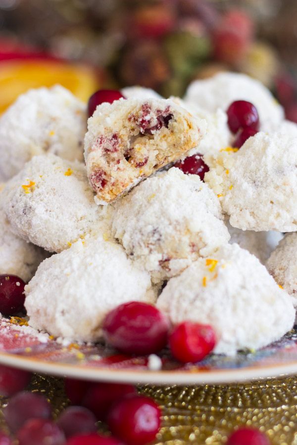 cranberry and orange snowballs on a plate