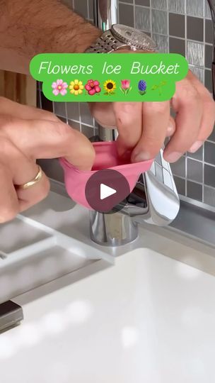 two hands are holding a flower ice bucket in front of a sink with the words flowers ice bucket on it