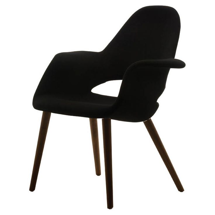 an upholstered black chair with wooden legs and arm rests on a white background