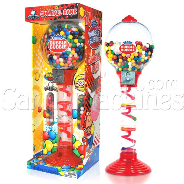 a gumball machine next to a box with it's contents in the shape of a candy dispenser