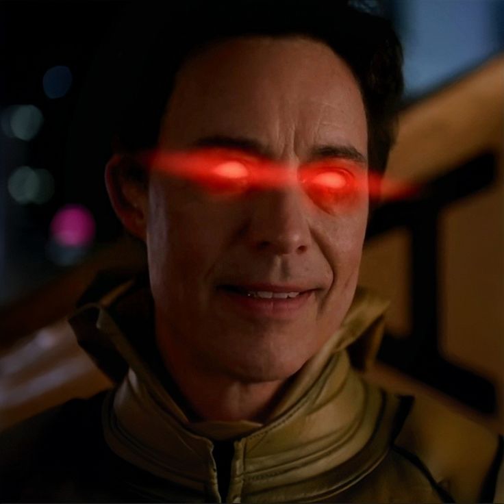 a man with glowing red eyes in a scene from the movie star trek into darkness