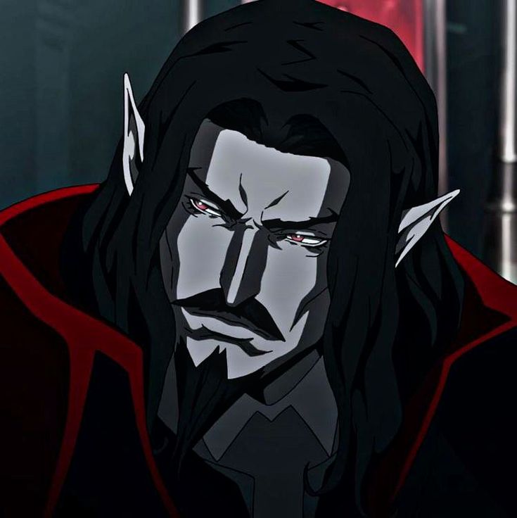 an animated image of a man with long black hair and red caper on his head