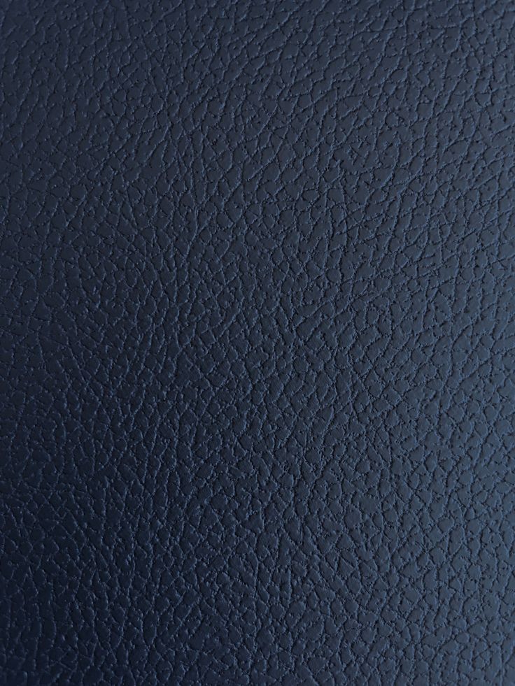 an up close view of a blue leather texture