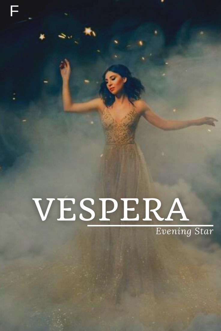 a woman in a long dress with her arms out and the words vespera on it