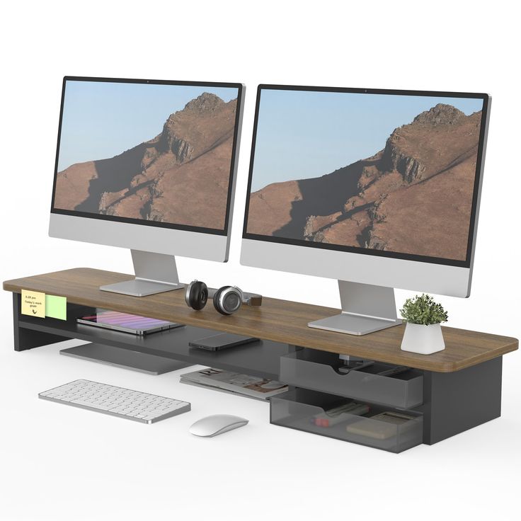 two computer monitors sitting next to each other on top of a wooden desk in front of a keyboard and mouse