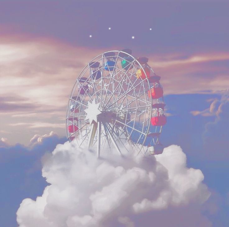 a ferris wheel sitting on top of a cloud in the sky