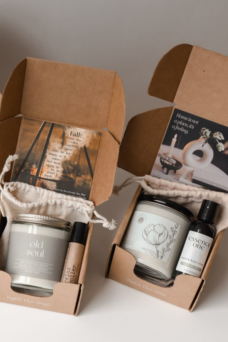 two open boxes containing candles and body care items