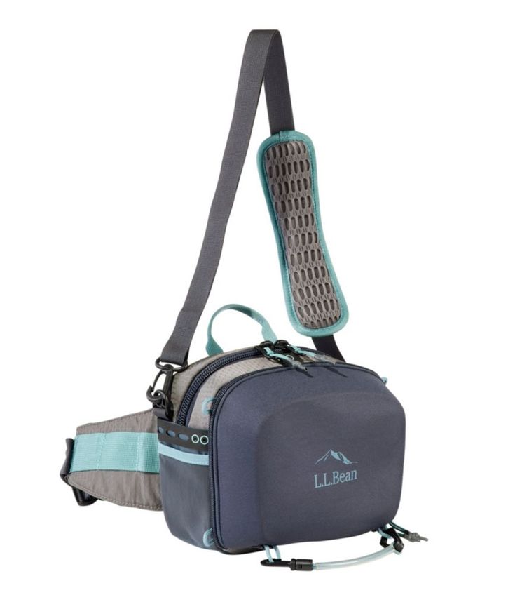 a gray and blue bag with straps on the bottom, one strap is attached to it