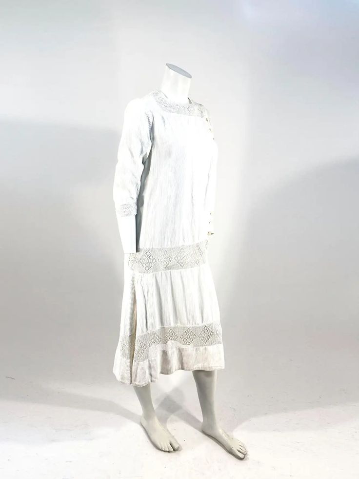 For Sale on 1stDibs - 1920s white ribbed cotton day dress featuring a dropped waist band of hand crochet border that corresponds with the crochet on the elbow cuffs, skirt border, 1920s Day Dress, Crochet Border, 20s Fashion, Crochet Borders, Cotton Crochet, Day Dress, Hand Crochet, Cotton Dresses, Day Dresses