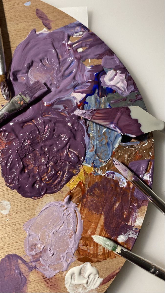 the paint is being mixed in with other paints