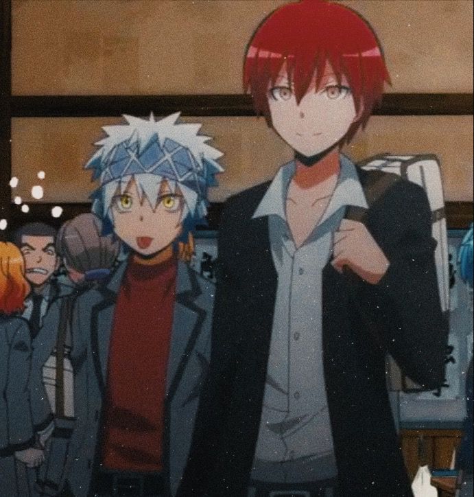 two people standing next to each other in front of a group of anime characters, one with red hair and the other white