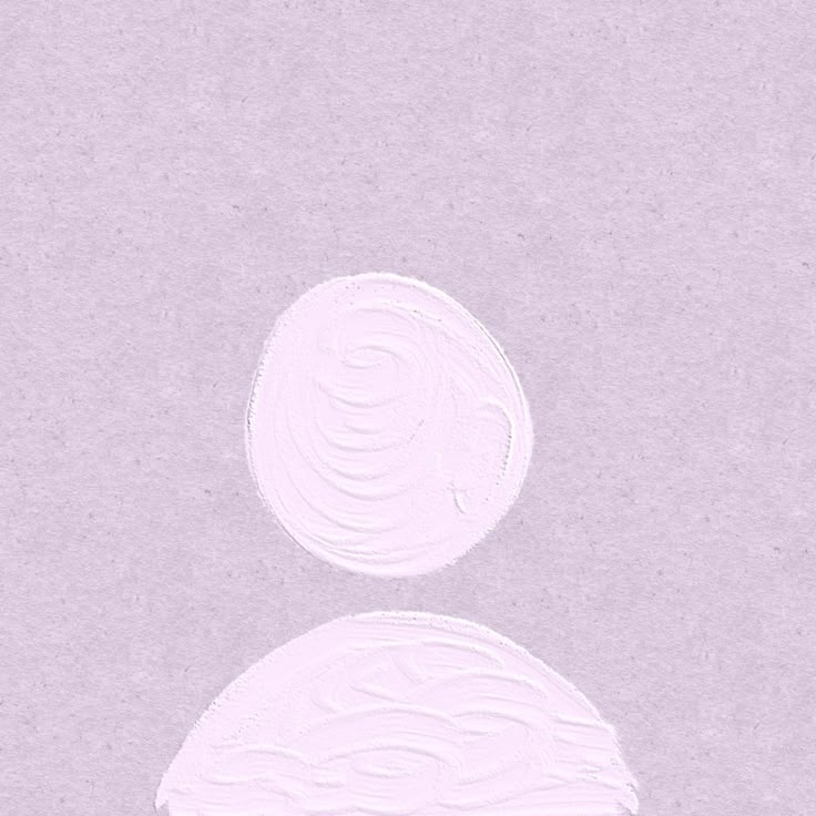 an image of two white circles on a light purple background