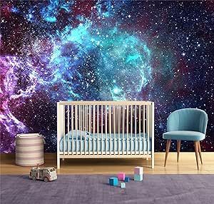 a baby's room with a crib and space wallpaper