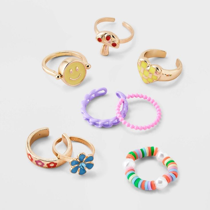 The Girls' 8pk Smiley Flip Ring Set - art class™ merges playful aesthetics with contemporary style. This set features a range of designs, from endearing hearts and cheerful smileys to elegant flowers and more, ensuring a diverse selection for every mood and occasion. The girls' 8pk smiley flip ring set from art class™ is easy to mix and match with various outfits. art class™: One-of-a-kind looks for the one and only you. Target Art, Class Jewelry, Flip Ring, Dark Rings, Multi Ring, Clothing Design Sketches, Kids Rings, Brass Band, December 2024