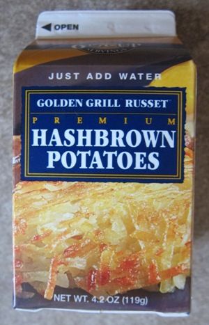 a package of hashbrown potatoes sitting on top of a wooden table