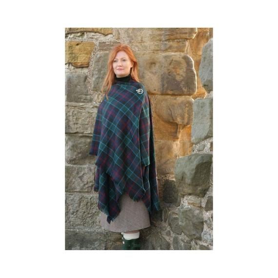 - Made in the USA from Tartan Woven in Scotland- Measures Approx. 54" x 65"- Medium Weight (12/13oz) Premium Wool- Over 500 Tartans Available- Also Known as a RuanaTartan serape perfect to wrap up in on a cold day.  A serape is like a shawl, except it has a hole cut out for the head, and it is split up the front. You can just let it drape, or you can wrap it over your shoulders. Finished sizes of approximately 54″ X 65”. Medium weight (12/13oz.) 100% premium wool. Available in over 500 tartans. Kilt Socks, Kilt Pins, Plaid Shawl, Homespun Fabric, Scottish Plaid, Tartan Fabric, Tartan Pattern, Kilt, Wool Fabric