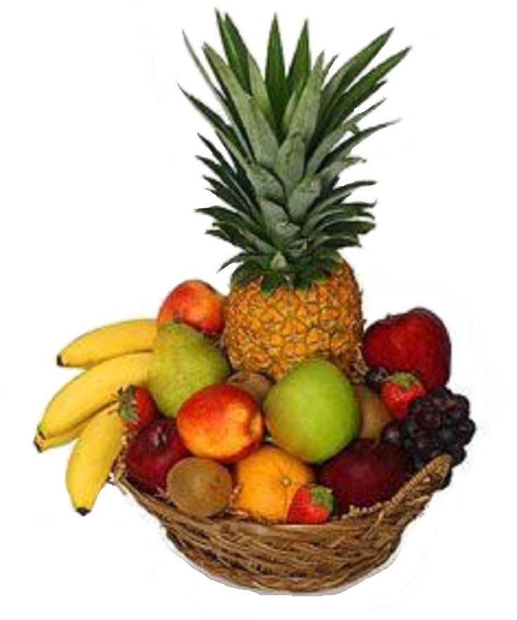 a pineapple, bananas, apples, and other fruit in a wicker basket