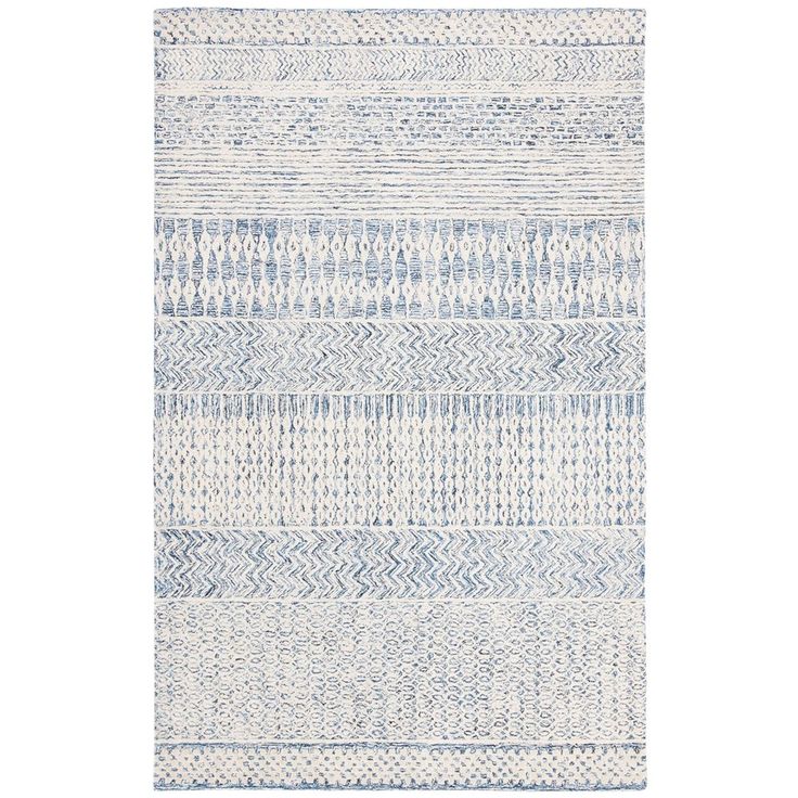 a blue and white rug on a white background