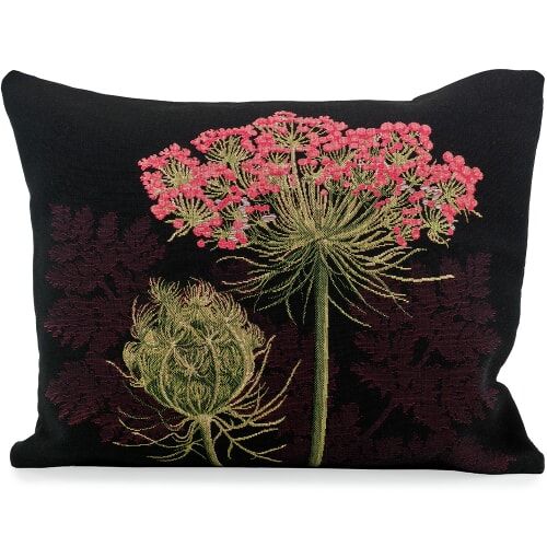 a black pillow with pink flowers on it