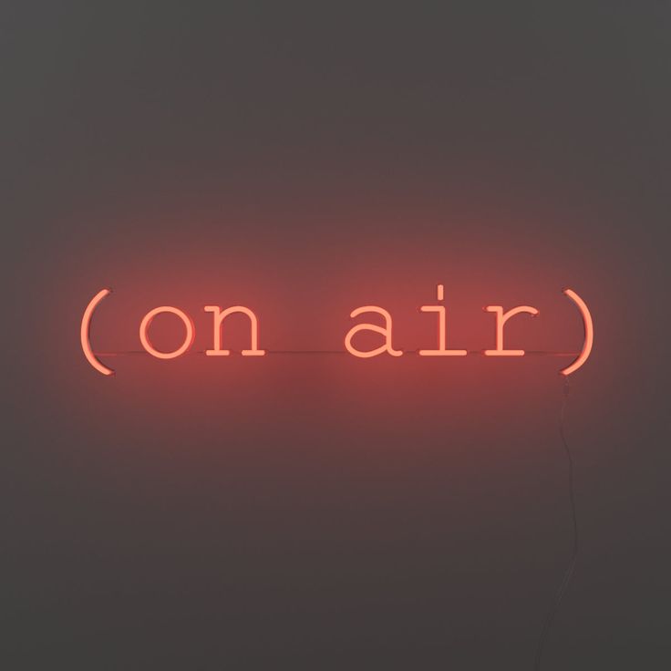 a neon sign that reads on air