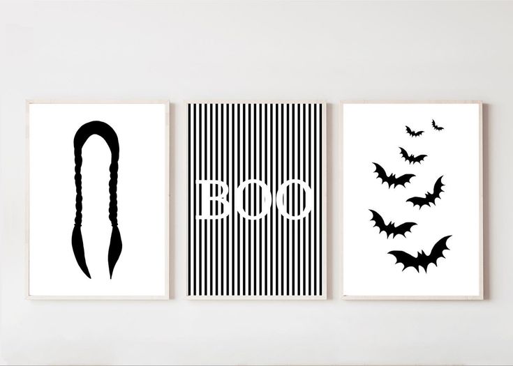 three black and white prints with bats hanging on the wall next to eachother