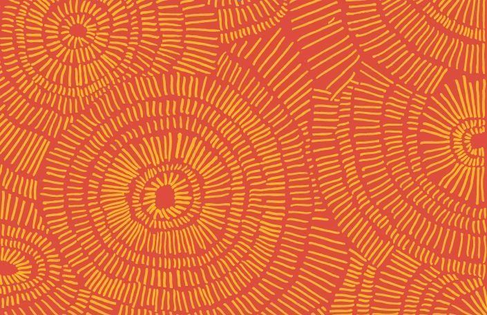 an orange and yellow pattern with circles on the center, as if it were made out of paper