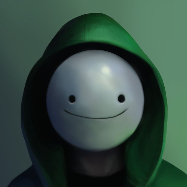 a person wearing a green hoodie with a smiley face