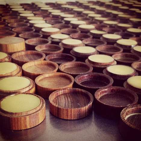 wooden bowls are lined up on the floor