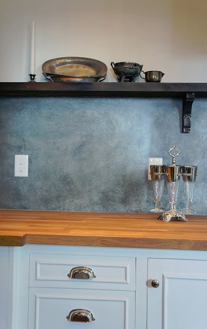 the kitchen counter is clean and ready to be used for serving wine or other drinks