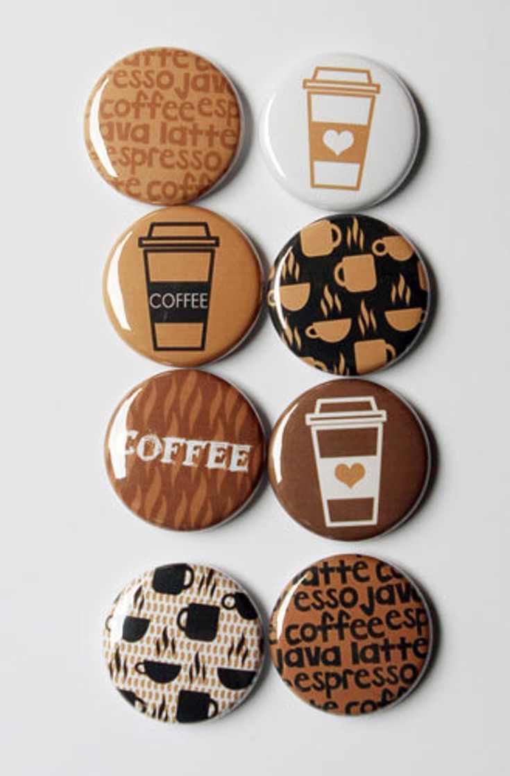 six coffee buttons with different designs on them