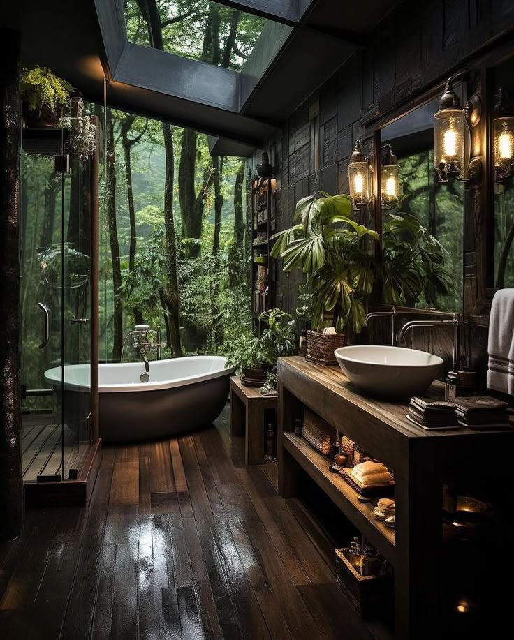 a bathroom with a large tub and wooden floors