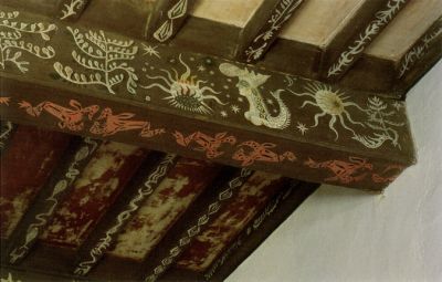 an ornately painted ceiling with decorative designs on the top and bottom part of it