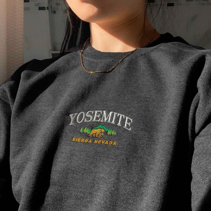 *SIZES ARE UNISEX* -I'd suggest your usual size for a more fitted look, or sizing up for a more relaxed fit. *these sweatshirts are extra comfy when oversized 🐻 "Yosemite Sierra Nevada" embroidered on a comfy cute vintage-style crewneck. A sturdy and warm sweatshirt bound to keep you warm in the colder months. A pre-shrunk, classic fit sweater that's made with air-jet spun yarn for a soft feel and reduced pilling. Your new favorite sweatshirt! * 50% cotton, 50% polyester * Pre-shrunk * Classic Crewneck Embroidery, National Park Shirt, Paris Shirt, Embroidered Crewneck, Embroidered Sweater, Favorite Sweater, Sierra Nevada, Cute Sweaters, Embroidered Sweatshirts