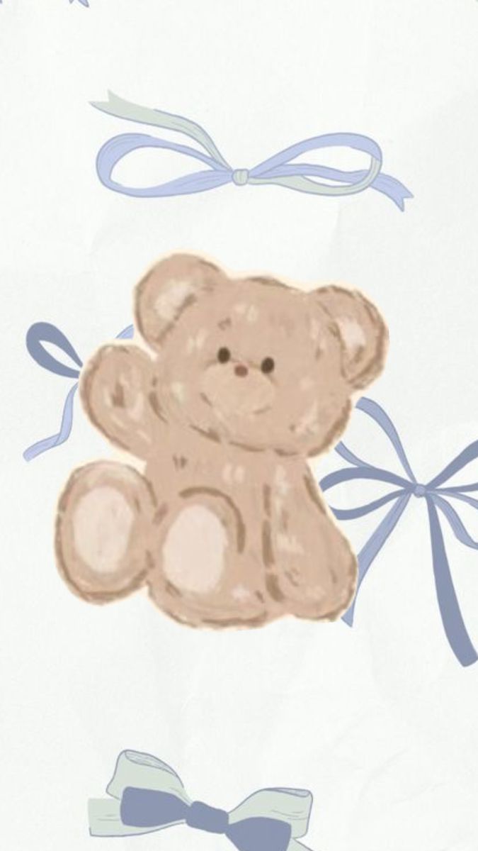 a brown teddy bear sitting on top of a blue and white blanket with bows around it's neck