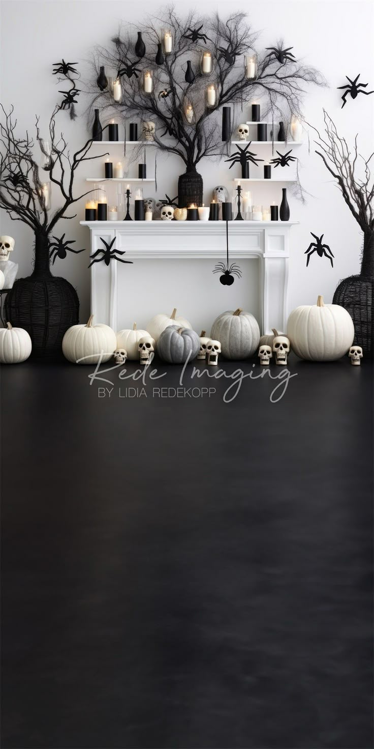 a black table topped with white pumpkins next to a fireplace covered in halloween decorations