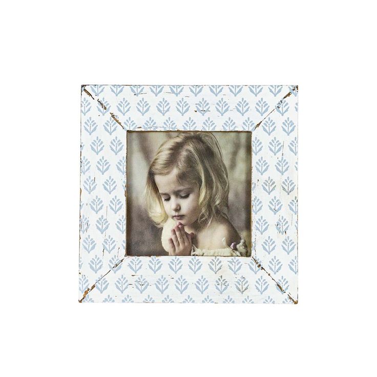 A design that complements traditional decor styles, this 4x4 square picture frame features a distressed white border with a repeating botanical pattern printed in light blue. The classic blue and white color combination offers a familiar look, while the exclusive pattern on the frame creates a unique decor accent. This frame is perfect for displaying your favorite photos or artwork and will add a whimsical charm to any room. Coastal Picture Frames, Square Picture Frame, Picture Frame Wood, Bedroom Stuff, 4x6 Picture Frames, Coastal Granddaughter, Gallery Wall Frames, Frame Wood, Wood Picture Frame