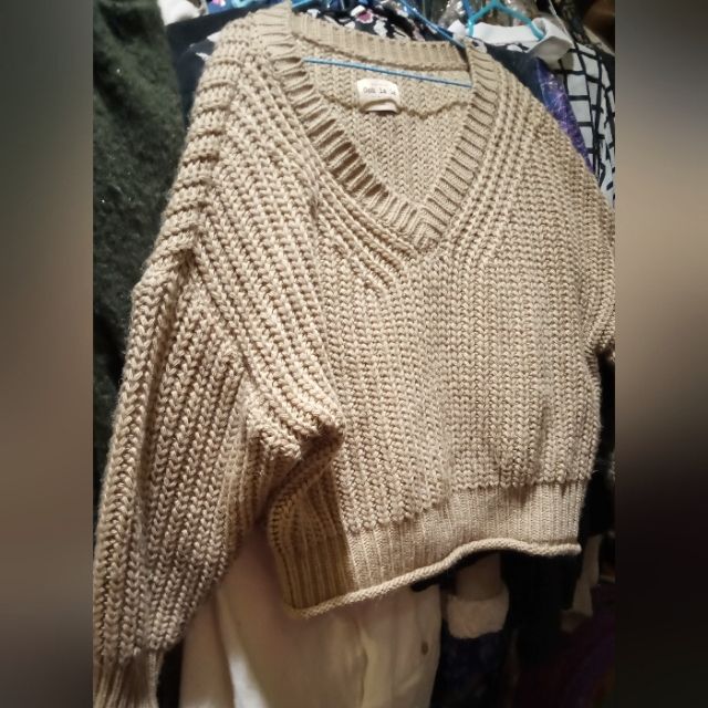 The Yarns On This Sweater Are Very Very Soft And The Stitched Use Is Very Dynamic It Has Ripped Cups And Ham Great Casual Look With Drop Shoulders And A Waggling Fit With Versatile Camel Color No Tags But Never Worn The Size Is Large Or Extra Large The Length Is 22 In The Bust Is 44 In The Brand Is Ooh La La Polish Brand Cheap Zara Women's Sweater, Brown Textured Knit V-neck Top, Cozy V-neck Cropped Sweater For Fall, Winter Knit V-neck Sweater, Neutral V-neck Sweater For Winter, Neutral V-neck Winter Sweater, Neutral V-neck Sweater For Fall, Fall Neutral V-neck Sweater, Cream Chunky Knit V-neck Sweater