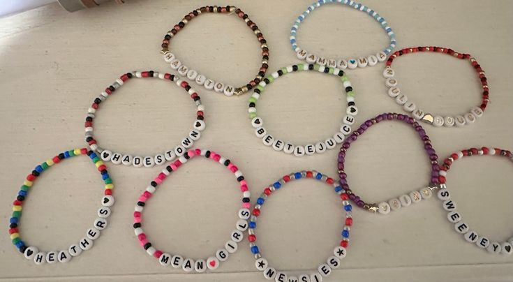 Musical Theatre  Friendship Bracelets! Can be customized for any musical! Musical Theatre Bracelets, Pony Bead Bracelets, Bracelets Handmade Beaded, Bead Bracelets, Pony Beads, Musical Theatre, Braided Bracelets, Friendship Bracelet, Handmade Bracelets