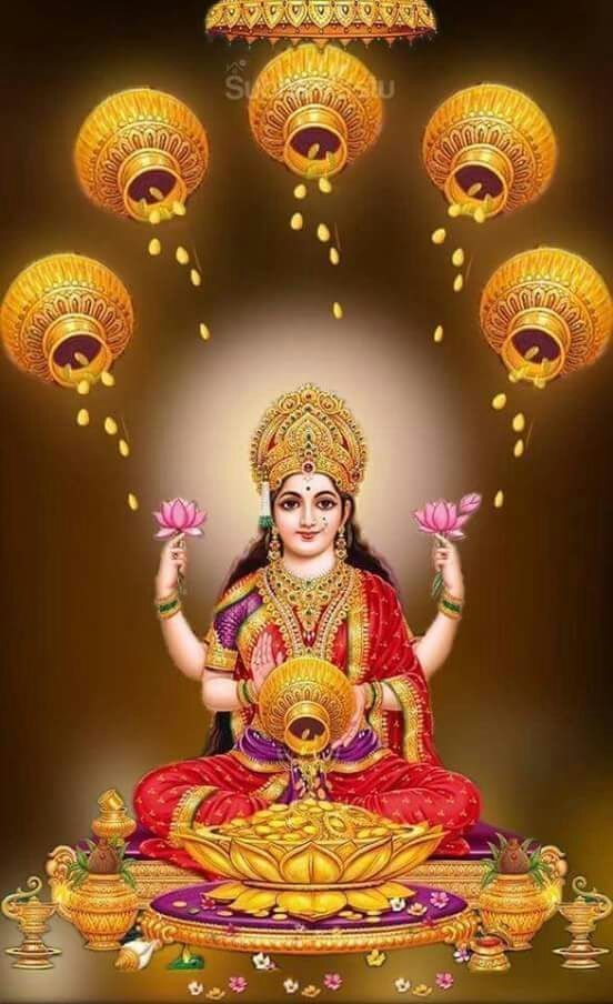 the hindu goddess sitting on her lotus