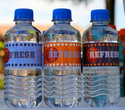 three bottled water bottles sitting next to each other