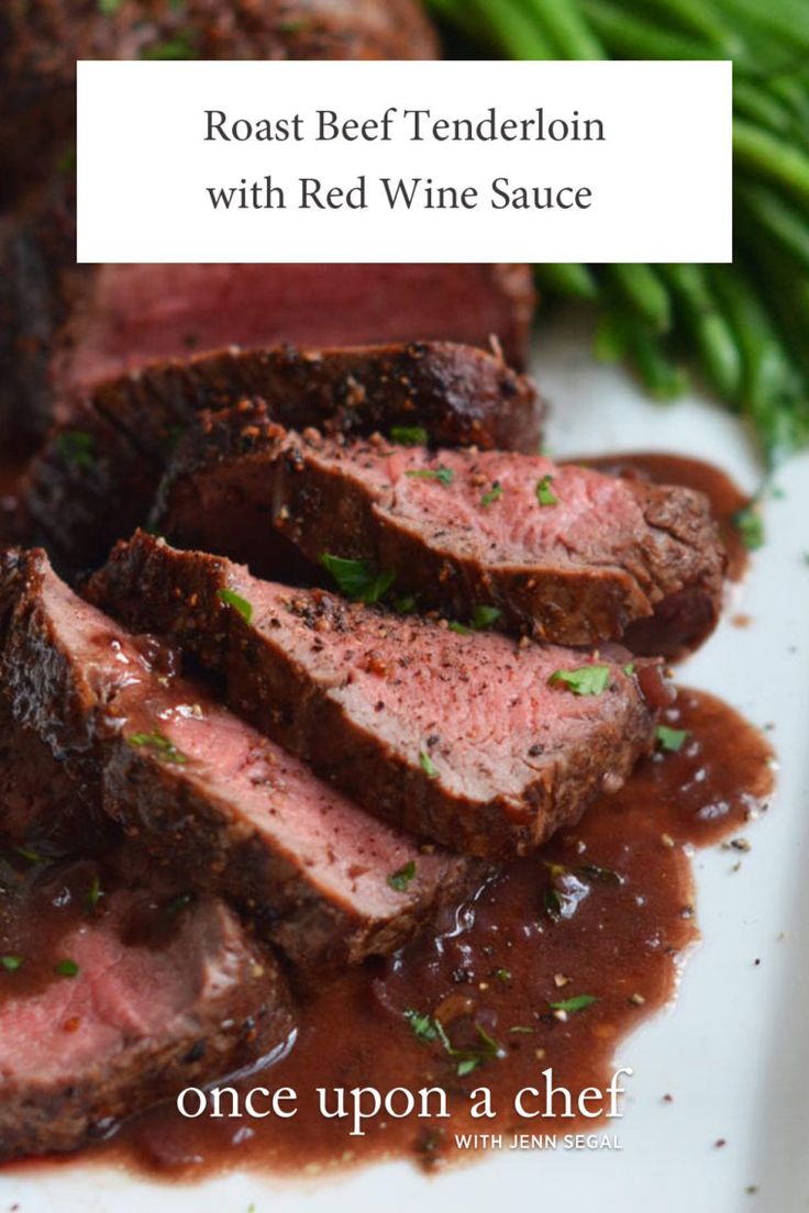 roast beef tender with red wine sauce on a plate